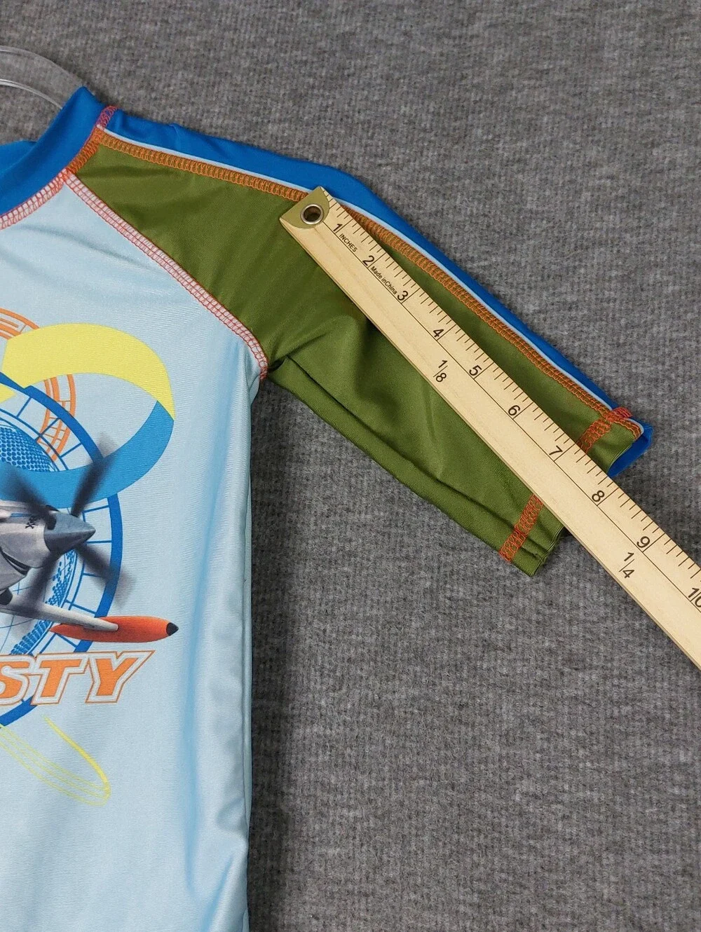 DISNEY STORE PLANES DUSTY CROPHOPPER BOYS BLUE 1/2 SLEEVE RASH GUARD SWIM TOP 7
